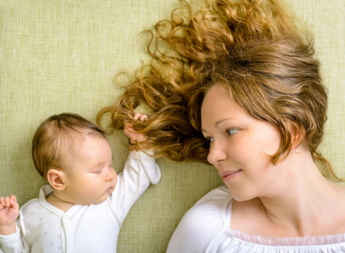 Post-Partum Hair Loss: Understanding the Biological Phenomenon and Navigating Recovery